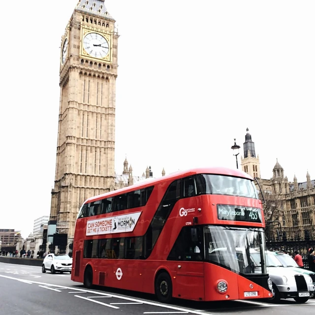 a red double decker bus driving down a street, by Joe Bowler, pexels contest winner, hypermodernism, big ben, 💋 💄 👠 👗, grey, ariana grande photography