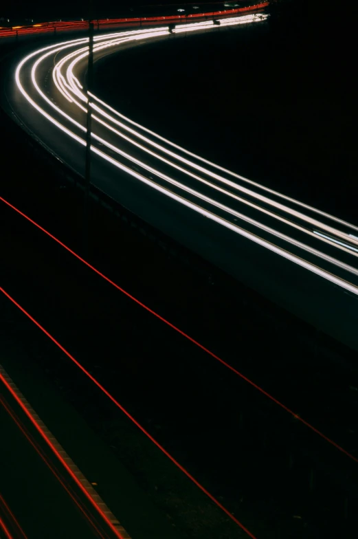 a long exposure photo of a highway at night, pexels contest winner, light and space, red and white neon, swoosh, phone photo, thin black lines