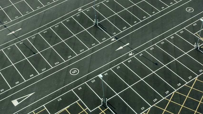 an overhead view of an empty parking lot, graphic print, black, square, environmental
