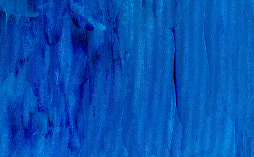 a close up of a blue painting on a wall, inspired by Yves Klein, pexels, abstract art, plain background, multiple brush strokes, textured canvas, coloured background