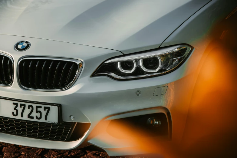 a close up of the front of a bmw car, renaissance, square, 4k photo”