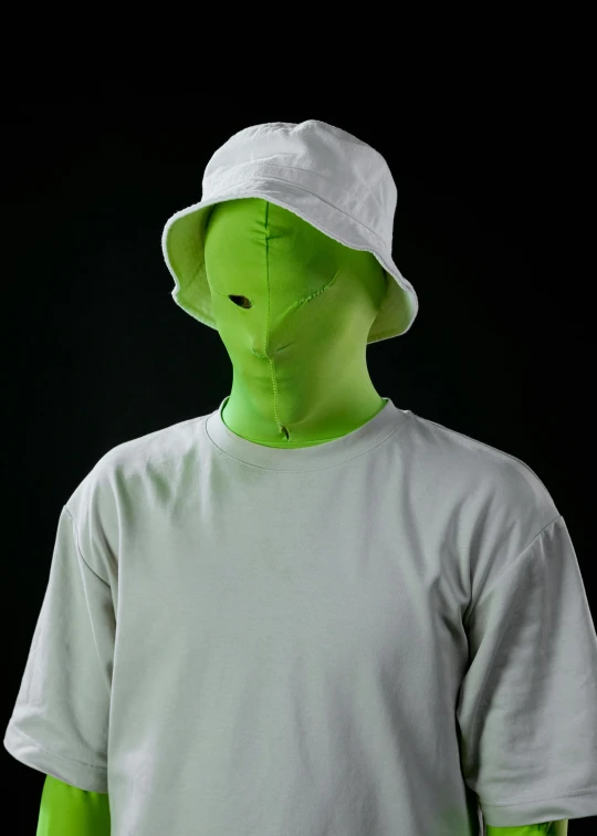 a green alien wearing a white hat and a white t - shirt, reddit, face covers half of the frame, adult swim style, official product photo, scp 3008