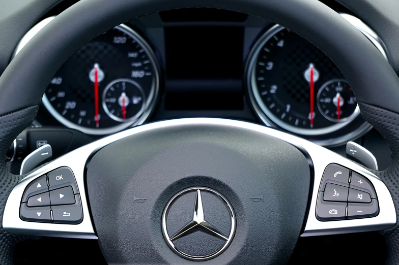 a close up of a steering wheel in a car, a digital rendering, pexels, photorealism, mercedez benz, ilustration, “hyper realistic, gauges