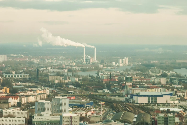 a view of a city from the top of a building, by Sebastian Spreng, pexels contest winner, bauhaus, power plants with smoke, hannover, highly detailed image, fine art print