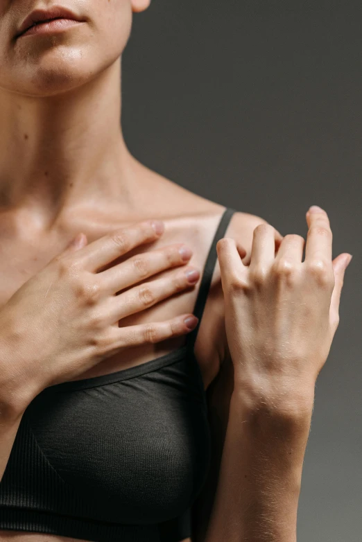 a woman with her hands on her chest, shutterstock, recovering from pain, square, scaled arm, pointing