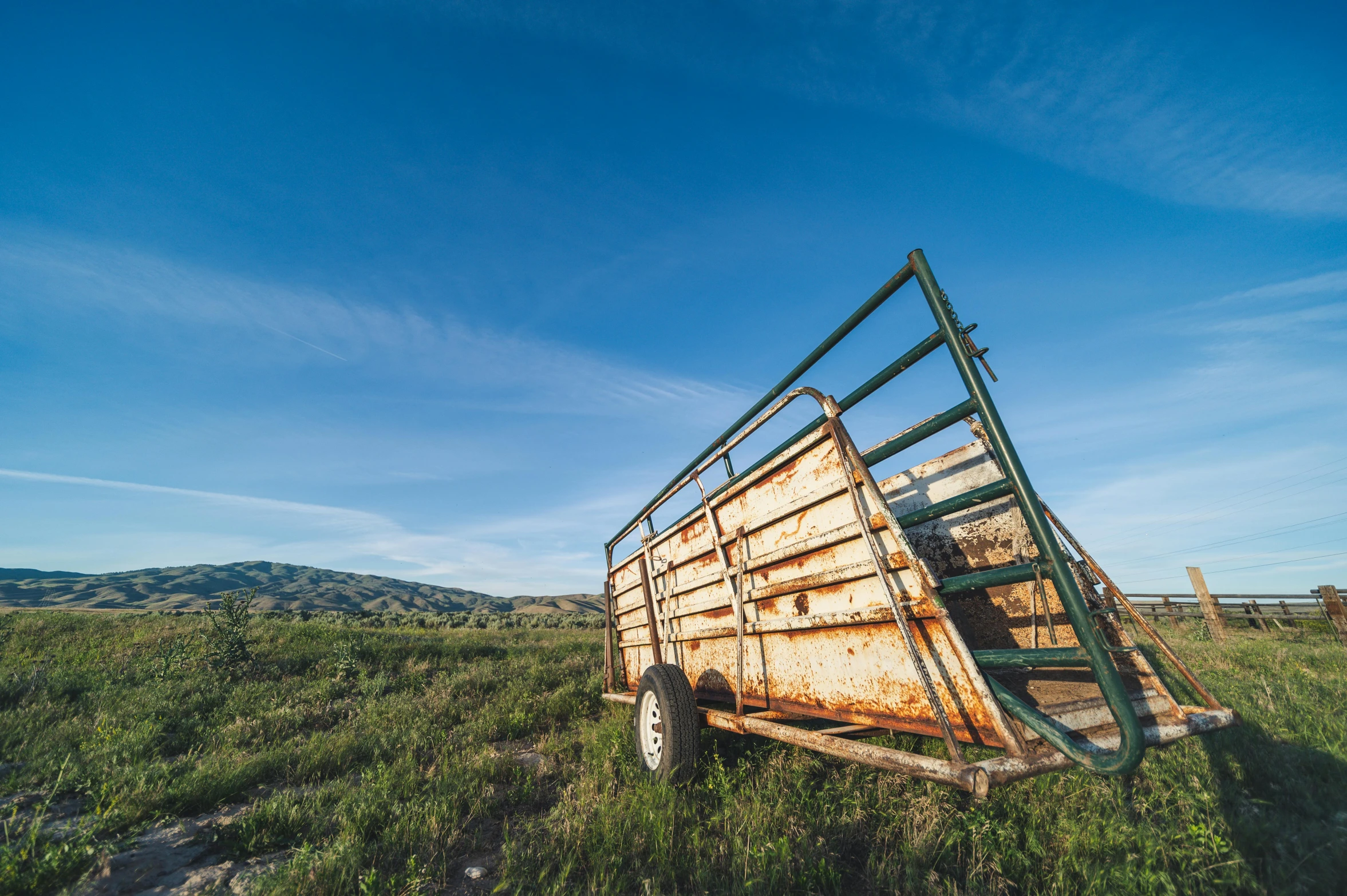 a truck that is sitting in the grass, by Jessie Algie, unsplash, renaissance, cart, big sky, rusted panels, profile image