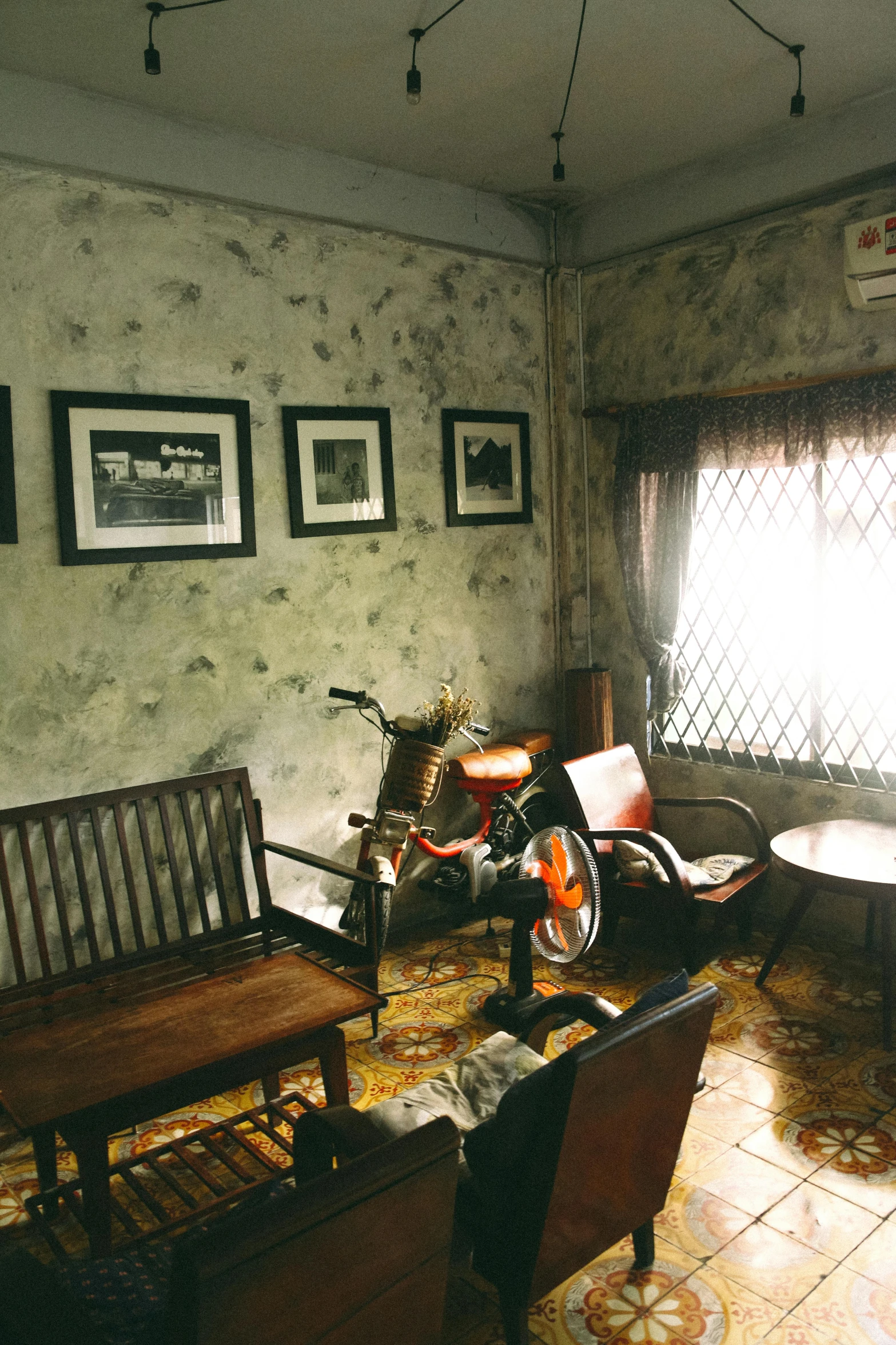 a living room filled with furniture and a motorcycle, by Yosa Buson, historical setting, bangkuart, square, indoor picture