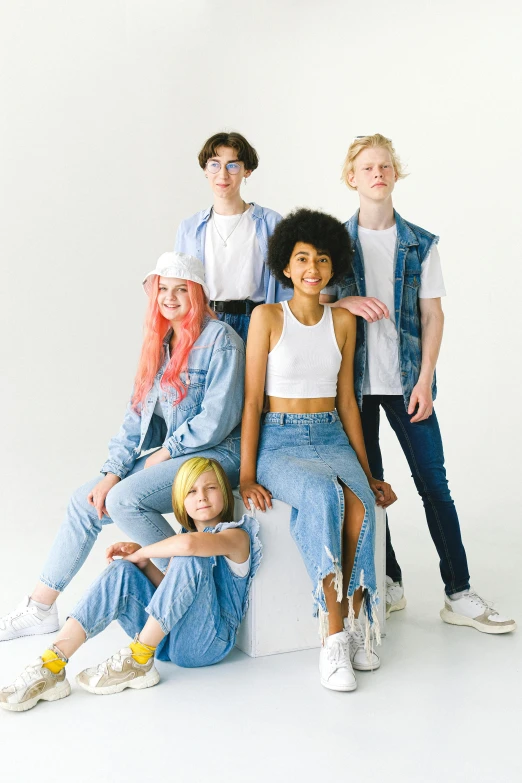 a group of young people posing for a picture, an album cover, trending on pexels, antipodeans, blue jeans, albino, teen girl, 15081959 21121991 01012000 4k