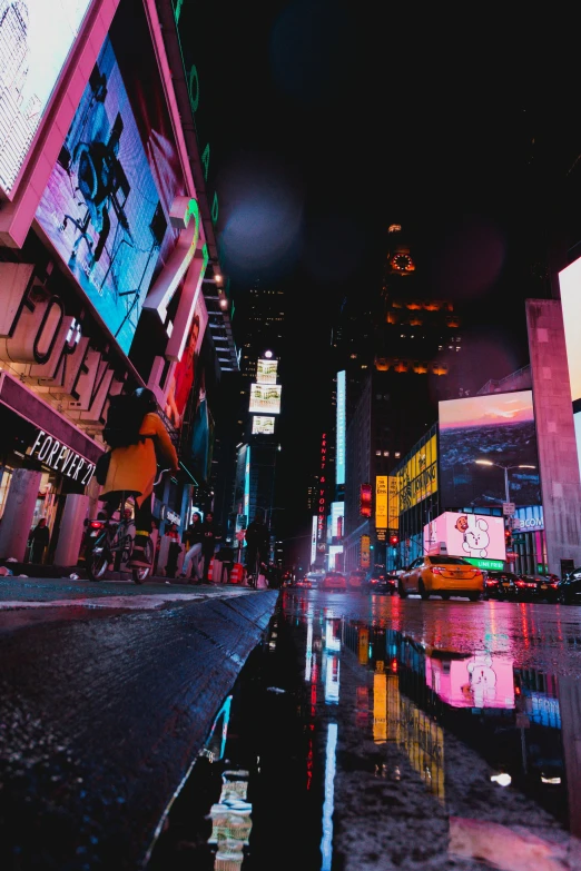 a city street filled with lots of traffic at night, a picture, pexels contest winner, pixel art, standing in time square, rain aesthetic, colorful signs, instagram story