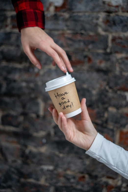 a person handing a cup of coffee to another person, graffiti, in style of joel meyerowitz, official product photo, hidden message, small