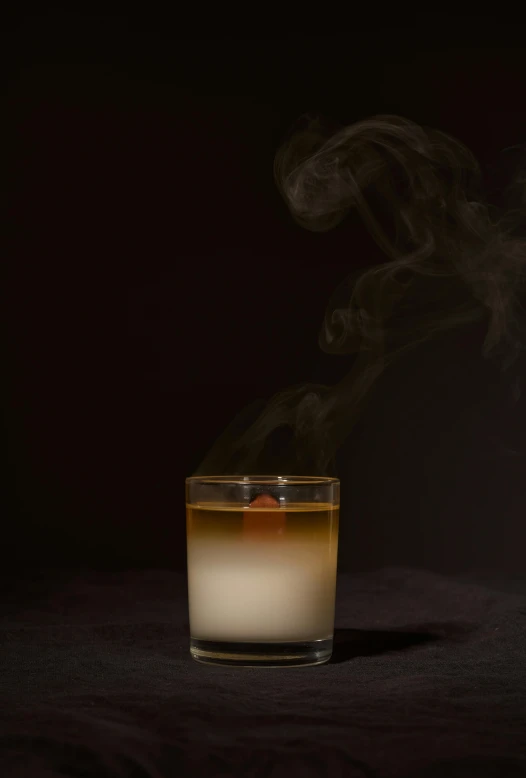 a glass filled with liquid sitting on top of a table, by Alison Geissler, purism, smoked layered, chilly, professional product photo, mid night