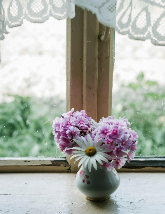 a vase of flowers sitting on a window sill, pexels contest winner, hazy and dreary, tucked out of view magic happens, rustic setting, pink