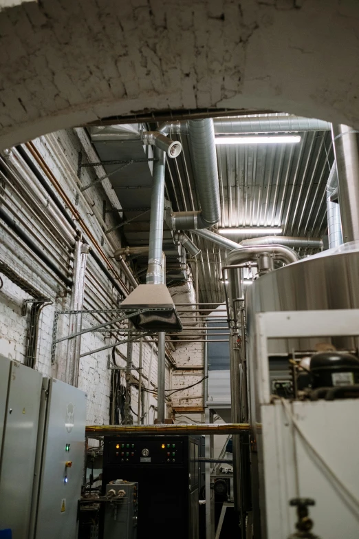 a room filled with lots of metal pipes, beer, overhead angle, white machinery, instagram story