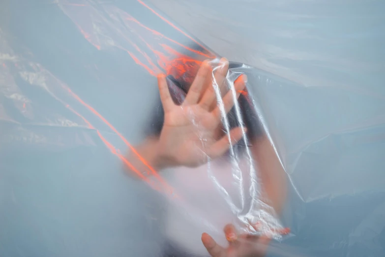 a woman covering her face with a plastic bag, an album cover, inspired by Elsa Bleda, pexels contest winner, plasticien, translucent neon, tickle fight in the death tent, gestural lines, ignant