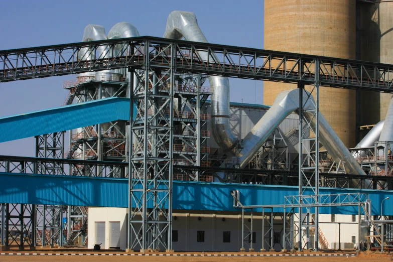 a large building with a bunch of pipes on top of it, somalia, steel mill, fan favorite, high quality product image”