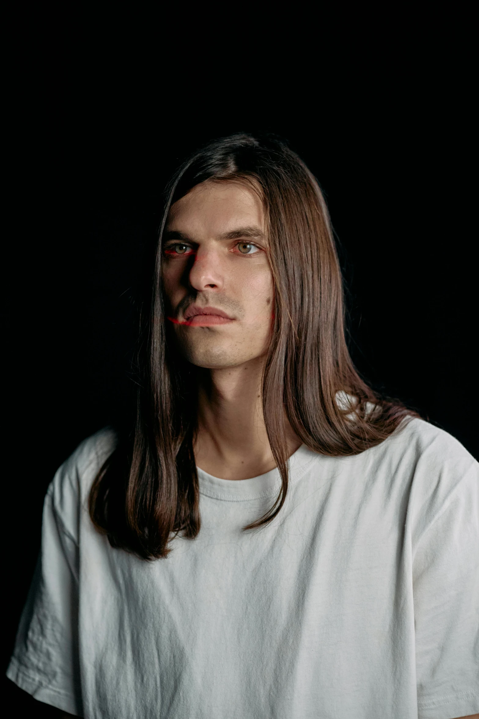 a man with long hair wearing a white shirt, by Tobias Stimmer, trending on unsplash, hyperrealism, steven klein, brown long and straight hair, non binary model, combover