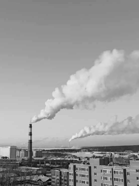 a black and white photo of a factory with smoke coming out of it, a black and white photo, by Mathias Kollros, pexels contest winner, purism, green smoggy sky, high quality!!!!!, espoo, overlooking