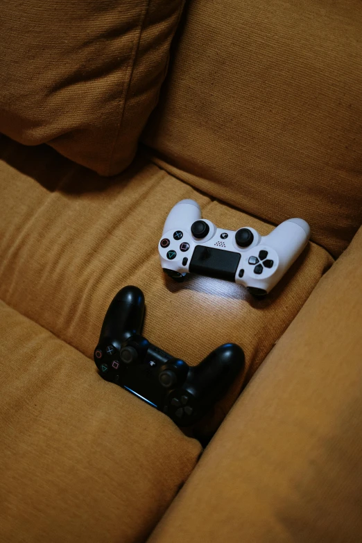 a couple of video game controllers sitting on top of a couch, 15081959 21121991 01012000 4k, shot on sony a 7, video game icon, video game cover