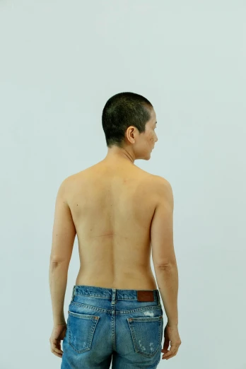 a man standing with his back to the camera, inspired by Zhang Kechun, hyperrealism, non binary model, 2 0 1 0 s, shinichi fukuda, straight neck
