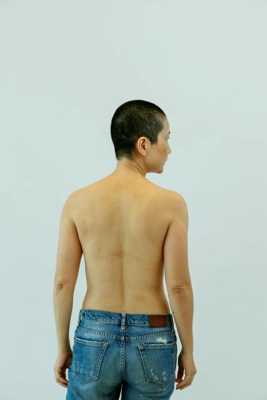 a man standing with his back to the camera, inspired by Zhang Kechun, hyperrealism, non binary model, 2 0 1 0 s, shinichi fukuda, straight neck