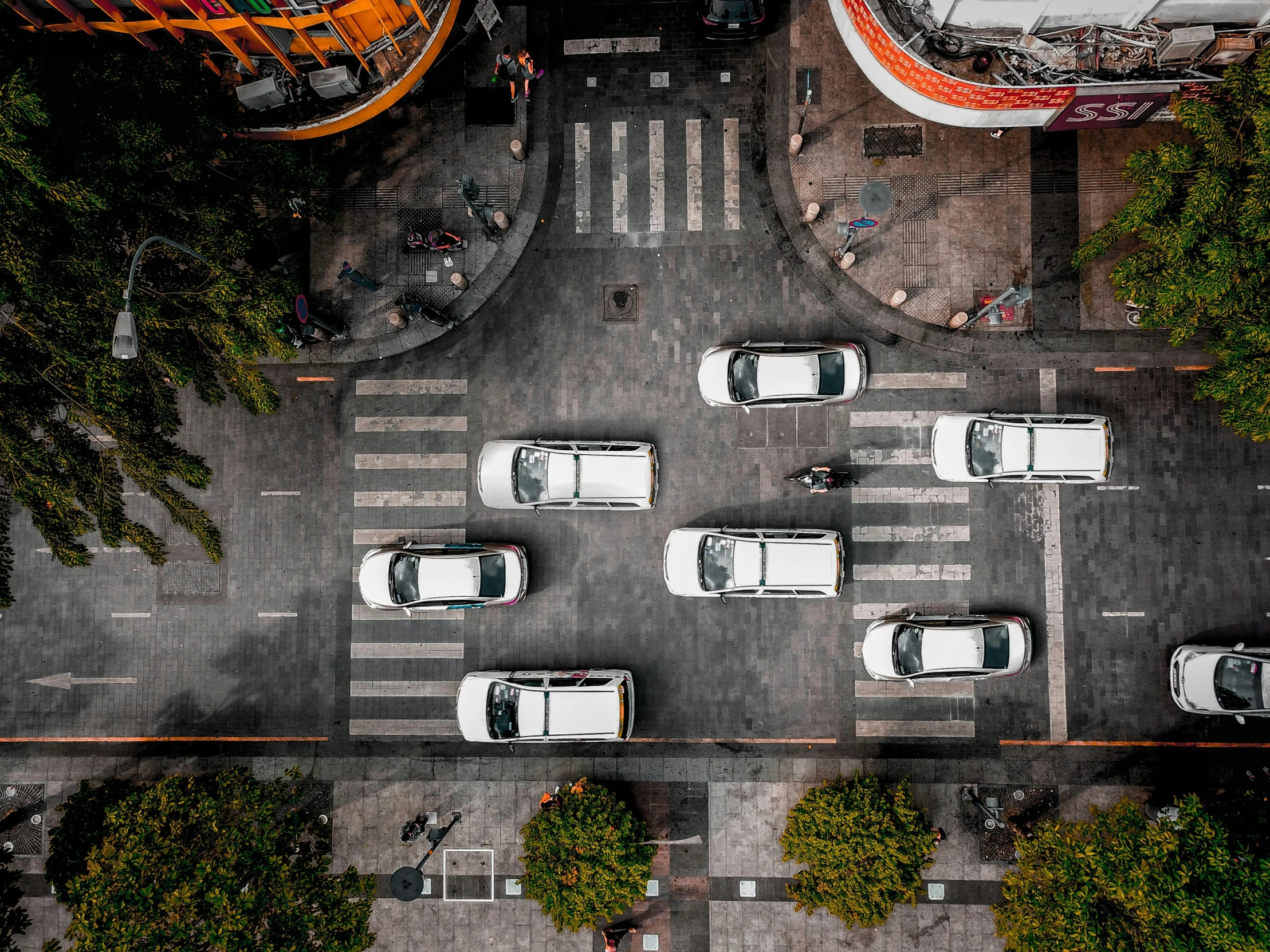 a street filled with lots of traffic next to tall buildings, pexels contest winner, happening, top-down view, thailand, square, thumbnail