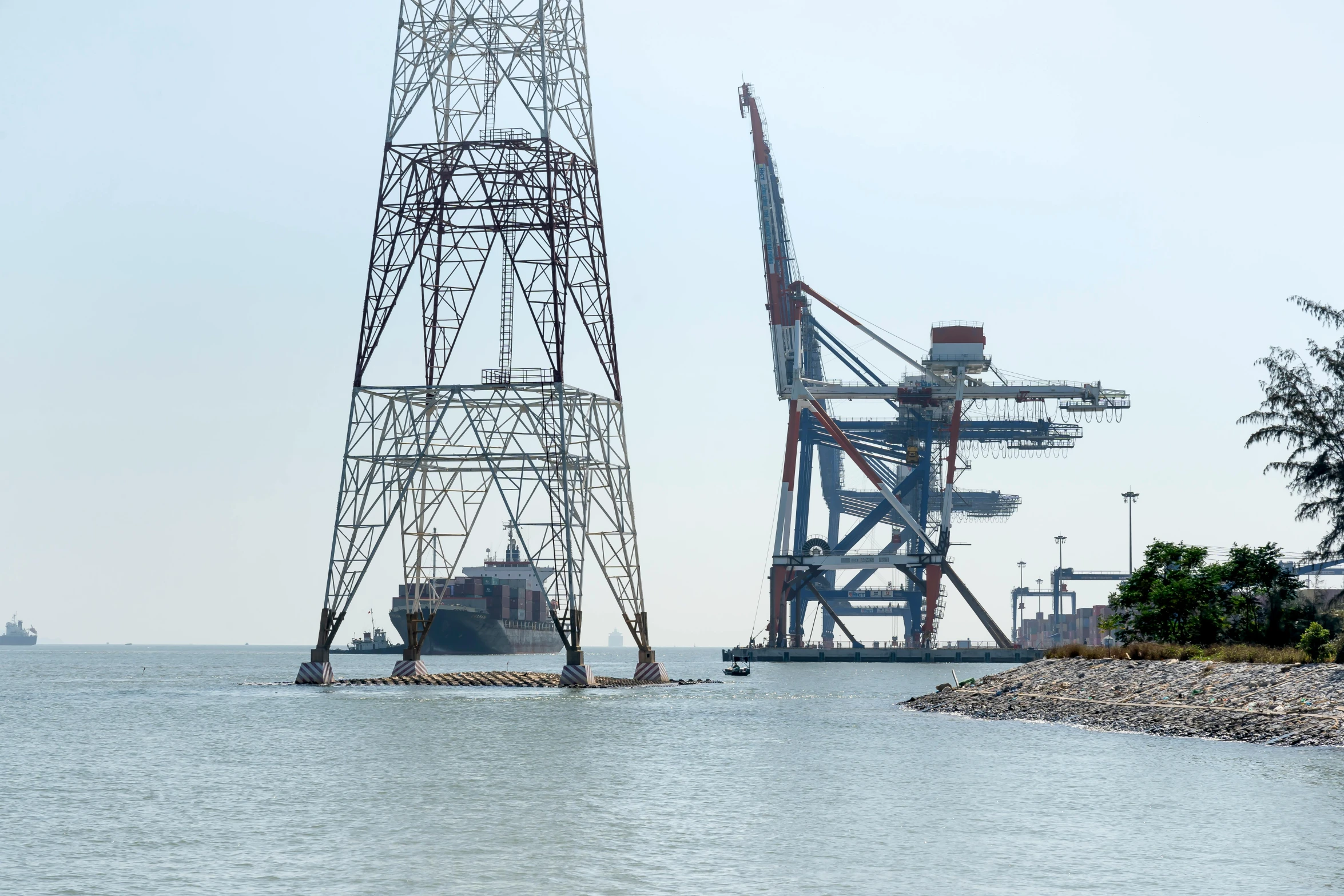 a large crane sitting on top of a body of water, a portrait, flickr, pylons, 2022 photograph, port, 8k octan photo