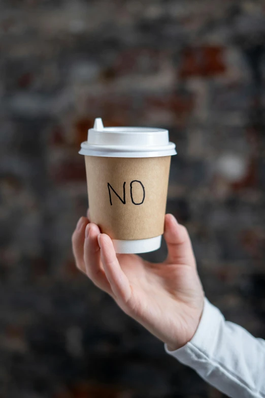 a person holding a coffee cup with no written on it, by Nina Hamnett, excessivism, no restaurant, thumbnail, do, paper cup