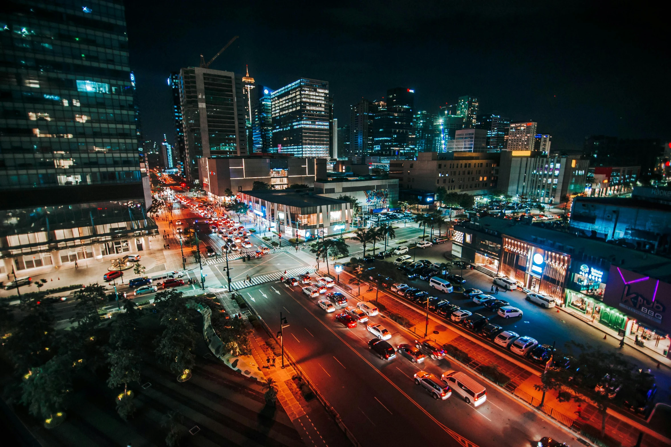 an aerial view of a city at night, pexels contest winner, manila, photograph of the city street, ilustration, mongolia