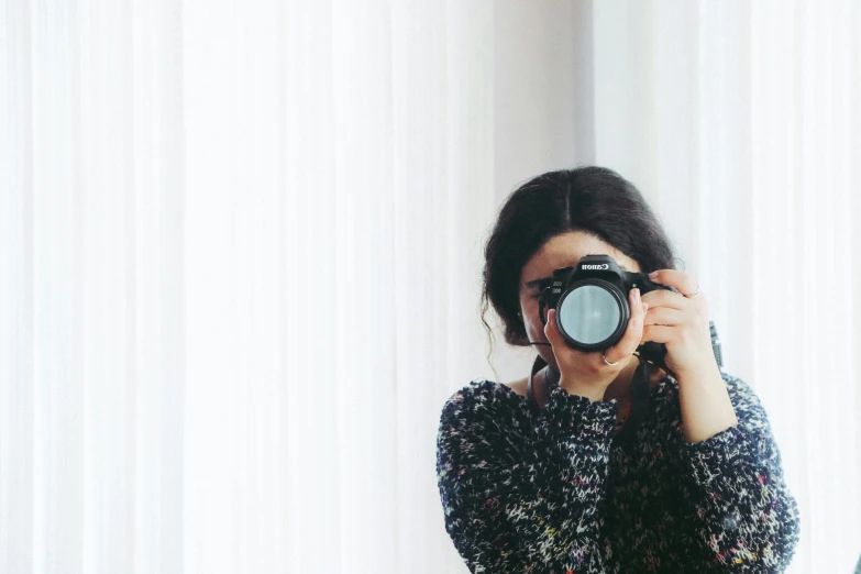 a woman taking a picture of herself with a camera, a picture, pexels contest winner, minimalism, lovingly looking at camera, photograph ”