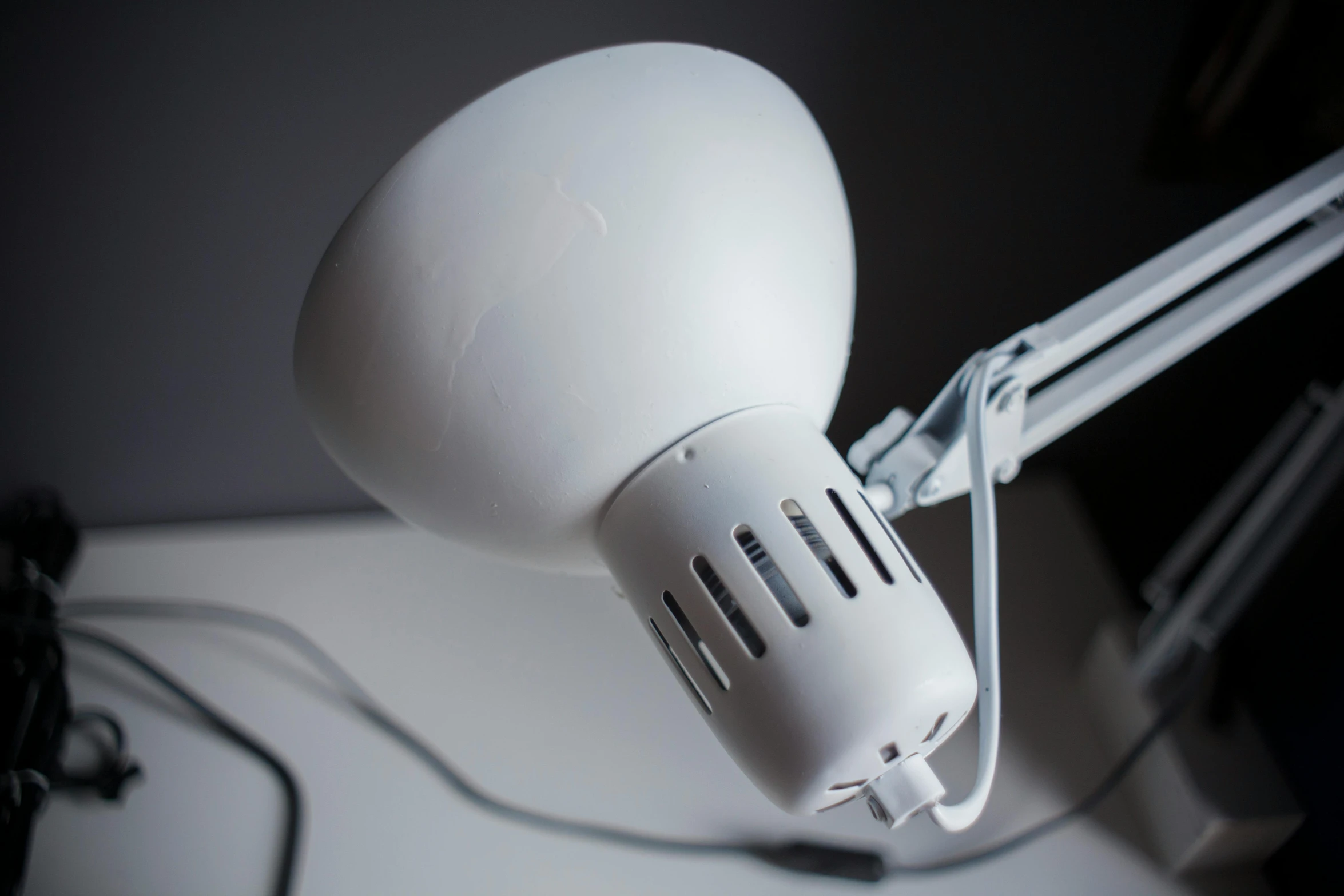 a desk lamp sitting on top of a white desk, by Niels Lergaard, pexels contest winner, light and space, hairdryer, bottom body close up, white head, assembled