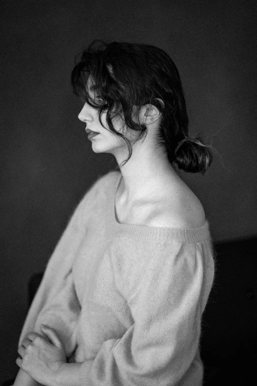 a black and white photo of a woman, unsplash, photorealism, song hye - kyo, wearing a sweater, medium format. soft light, lowres