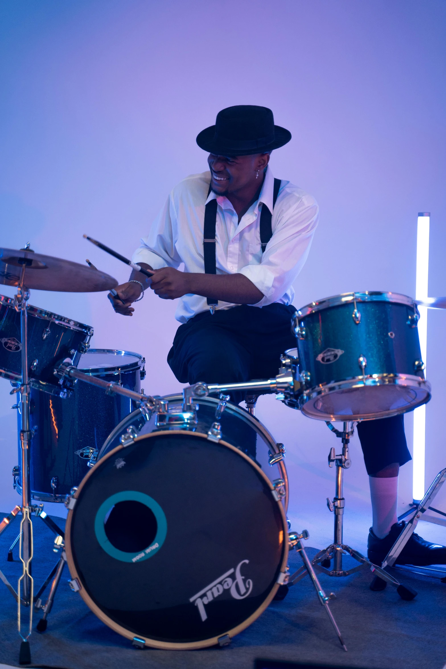 a man sitting on top of a drum set, profile image, top hats, jamal campbell, high quality photo