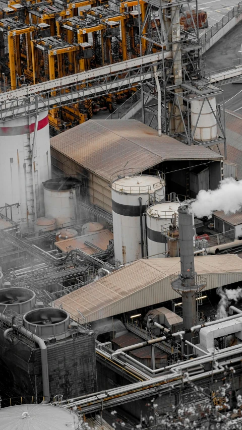 a factory with a lot of smoke coming out of it, pexels contest winner, renaissance, birdseye view, 8k detail, desaturated, thumbnail