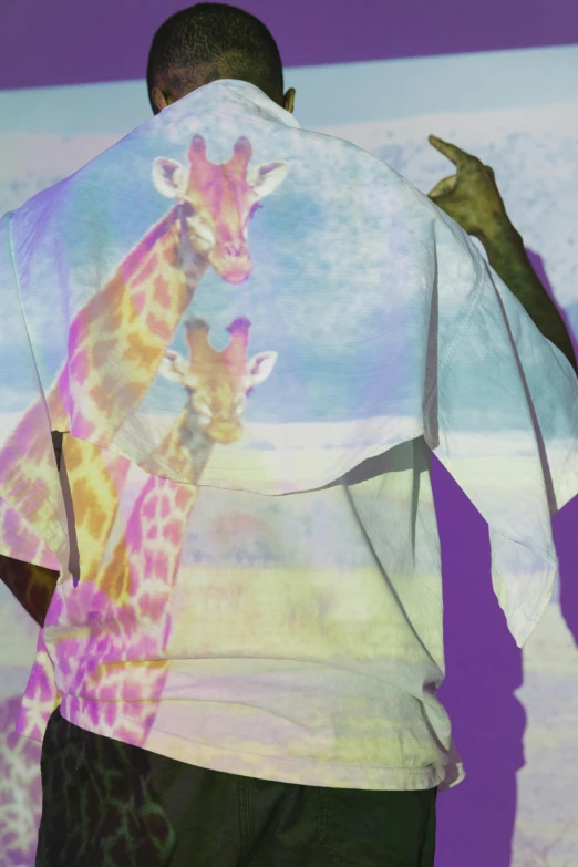 a man standing in front of a projection of a giraffe, an album cover, inspired by Anna Füssli, conceptual art, diaphanous iridescent silks, 144x144 canvas, an ai generated image, detail
