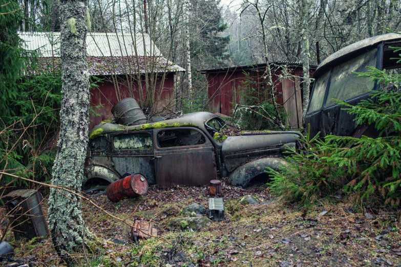 an old truck sitting in the middle of a forest, by Jesper Myrfors, photorealism, abandoned car garage, 2022 photograph, hasselblad photo, mossy buildings