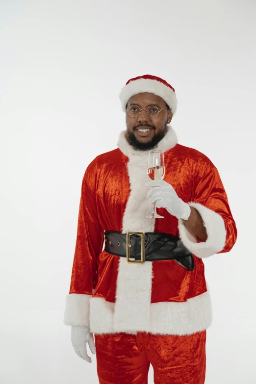 a man in a santa suit posing for a picture, mkbhd, ( ( theatrical ) ), promo image, ray lewis