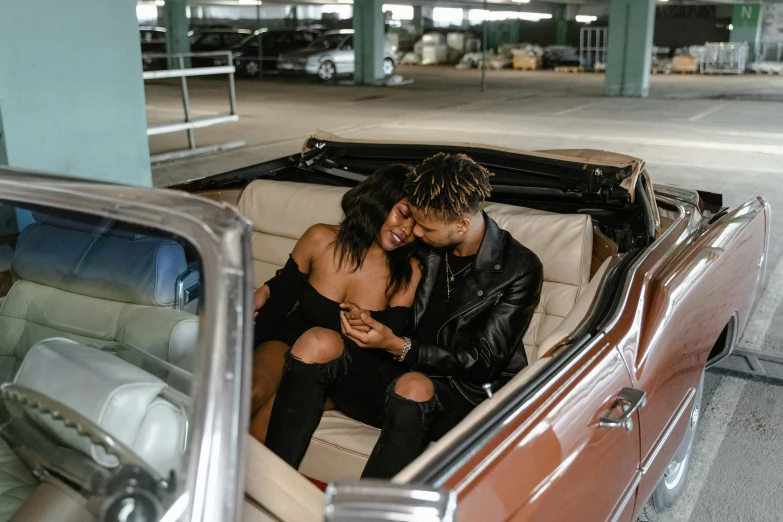 a man and a woman sitting in a car, trending on pexels, brown leather jacket, adriana chechik, ashteroth, rooftop romantic