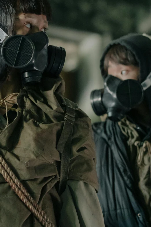 two men wearing gas masks standing next to each other, 8 k movie still, military-grade, iu, hiding
