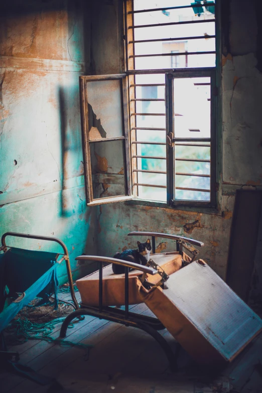 a bed sitting in a room next to a window, an album cover, trending on unsplash, arte povera, inside a decayed surgical room, old chairs, kowloon walled city, abandoned circus
