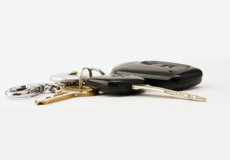 a bunch of keys laying on top of each other, a digital rendering, unsplash, hurufiyya, transparent black windshield, 2000s photo, realistic », minimalistic