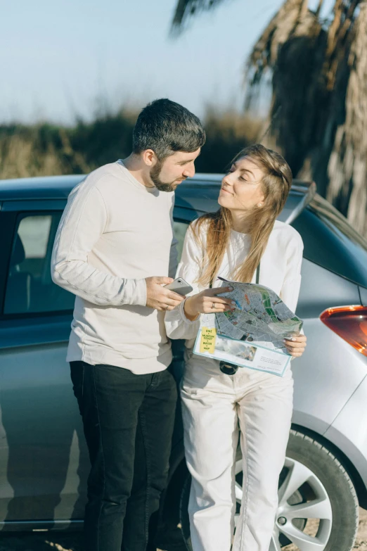 a man and woman standing next to a car looking at a map, pexels contest winner, renaissance, square, 15081959 21121991 01012000 4k, flirting, high resolution image