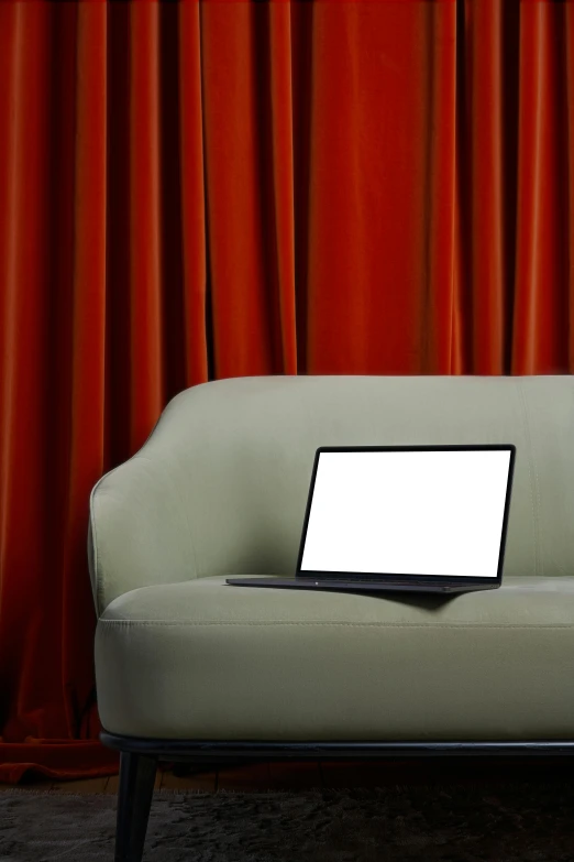 a laptop computer sitting on top of a white couch, by Carey Morris, computer art, red curtain, theatrical, demur, complaints