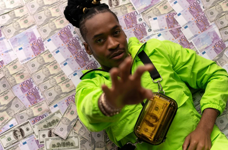 a man sitting on top of a pile of money, an album cover, pexels contest winner, holding a gold bag, lil uzi vert, 8k selfie photograph, skin : tjalf sparnaay