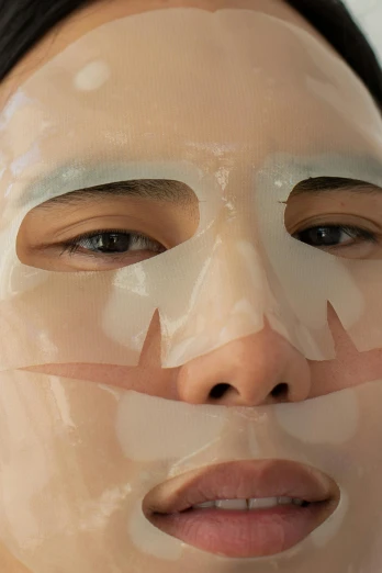 a woman with a sheet mask on her face, inspired by Nil Gleyen, reddit, dynamic closeup, asian male, facing front, silicone skin
