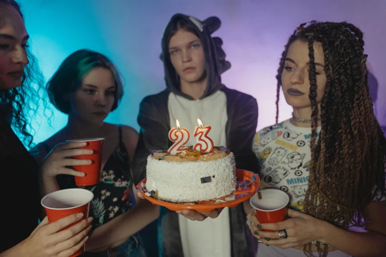 a group of people standing around a birthday cake, by Julia Pishtar, pexels, hyperrealism, photograph of three ravers, teenage no, 2263539546], yung lean