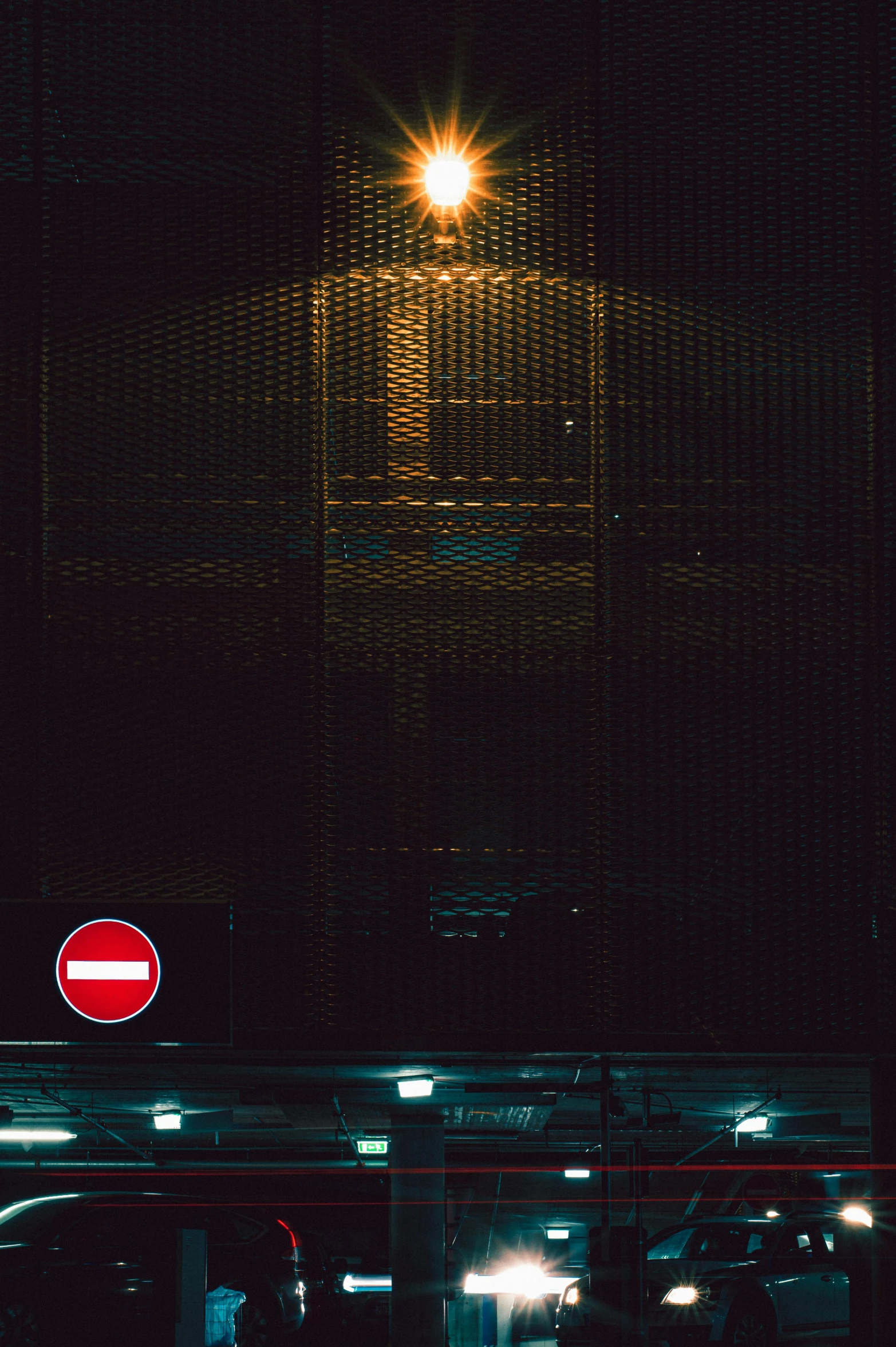 a red stop sign sitting on the side of a road, a picture, inspired by Elsa Bleda, dark futuristic, in the dark elevator, iso400, grid and web