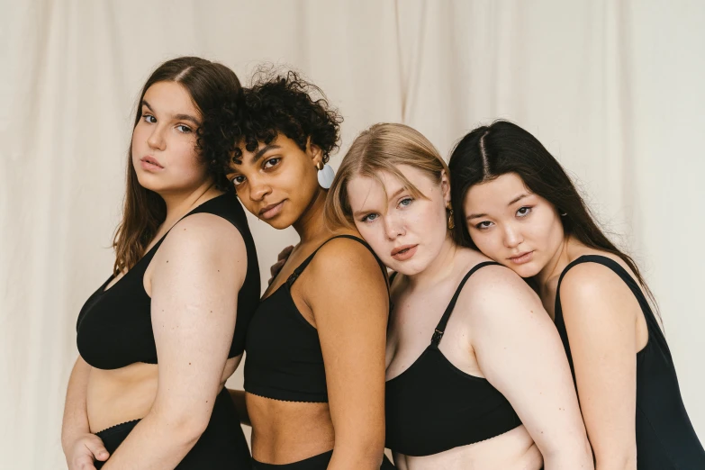 a group of women standing next to each other, inspired by Vanessa Beecroft, trending on pexels, renaissance, black bra, skincare, plump, black