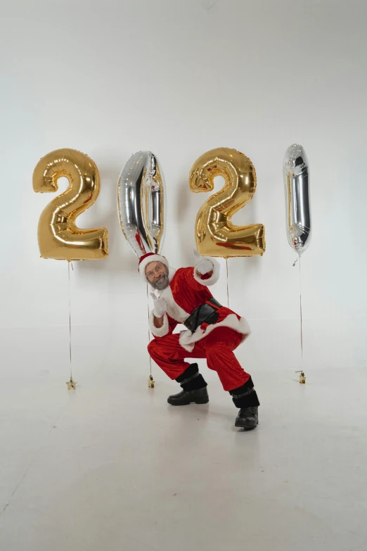 a santa claus standing in front of a number of balloons, by Ryan Pancoast, happening, 2 0 2 5 popstar comeback single, graduation photo, 2 0 2 2 photo, smol