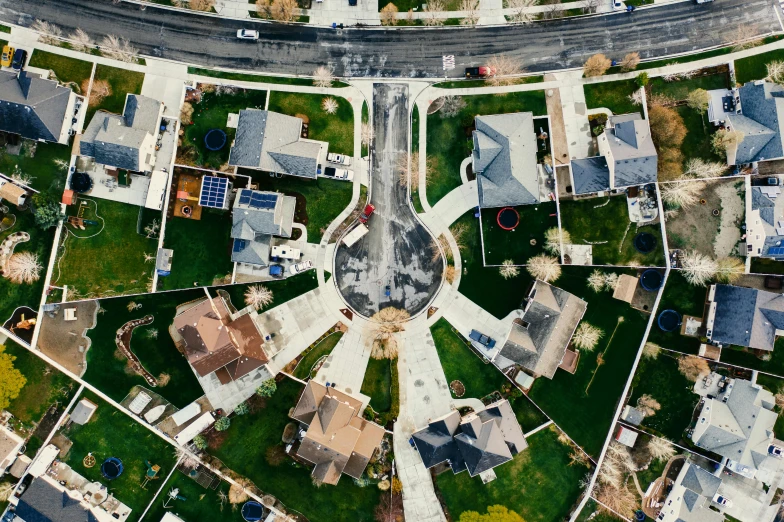 a bird's eye view of a residential neighborhood, pexels contest winner, multiple wide angles, everything enclosed in a circle, looking sad, subdivision