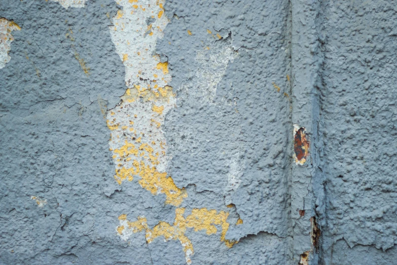 a close up of a wall with peeling paint, unsplash, prussian blue and azo yellow, background image, grey, archival pigment print